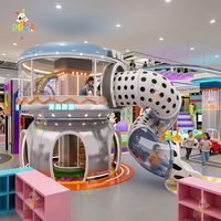 Ensemble de jeux d'intérieur commercial sur le thème de la ville du futur, avec toboggan en S, toboggan géant, piscine à balles, carrousel interactif LED et trampoline
