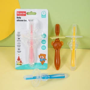 Venta al por mayor OEM cepillo de dientes de silicona para bebés cepillos de dientes de cerdas suaves para aprender a cepillarse los dientes productos maternos y para bebés - Product Image 2