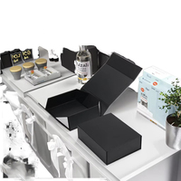 Boîte cadeau magnétique noire de luxe avec logo personnalisé pour l'emballage des vêtements, boîte en papier rigide pliable pour les articles de sport en gros