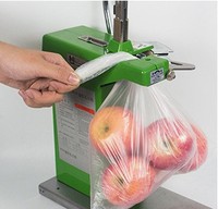 Machine à corder les ongles en aluminium avec tondeuse pour supermarché Nouvelle machine à sceller les sacs en maille de nylon manuelle d'emballage vertical