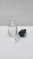 Botella de Vidrio Redonda de 30 ml Personalizada para Aceites Esenciales con Gotero y Tapa a Buen Precio