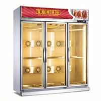 Vitrine réfrigérée verticale commerciale à trois portes vitrées avec éclairage LED en acier inoxydable pour le stockage de poulet, canard et oie