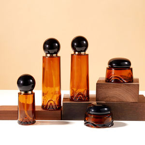 Botella <span class=keywords><strong>de</strong></span> Vidrio Redonda y Cuadrada <span class=keywords><strong>de</strong></span> Lujo Personalizada al por Mayor, Color Ámbar y Negro, <span class=keywords><strong>para</strong></span> Suero, Loción, <span class=keywords><strong>Perfume</strong></span>, Aceite, con Tapa <span class=keywords><strong>de</strong></span> Bola y Pulverizador Recargable - Product Image 1