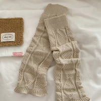 Chauffe-jambes gris à bord festonné, confortables, élégants et tendance