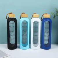 Bouteille d'eau portable transparente personnalisable de 550 ml et 1 L (32 oz) anti-fuite pour étudiants, avec manchon en silicone et couvercle en bambou