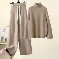 Ensemble double pull d'automne à col roulé et à manches longues en tricot torsadé et pantalon ample pour femmes