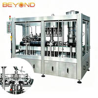 Machine monobloc automatique 4-en-1 2000BPH pour le lavage, le remplissage, le bouchonnage et le ligaturage de bouteilles en verre de 750 ml pour champagne et vin mousseux