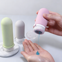 Meilleures ventes - Bouteilles de voyage en silicone compressibles de qualité alimentaire approuvées par la TSA, 2 oz (100 ml), avec conception anti-fuite à 3 couches, logo personnalisé