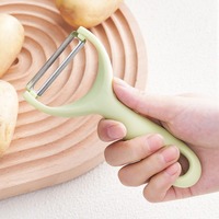 Handmatige verdikte multifunctionele roestvrijstalen 1-delige schilmes, aardappelschiller, fruit- en groentesnijder