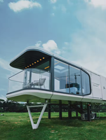 Maison conteneur préfabriquée de luxe en acier ignifuge, personnalisable et mobile, type capsule spatiale, 20 pieds/40 pieds, pour appartement et villa