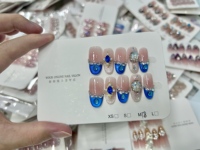 Faux ongles à presser faits main en gros, styles de luxe variés, avec strass 3D et chaîne de perles, longueur moyenne, formes amande et cercueil