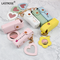 Mignon porte-clés en cuir coeur fleur forme Mini miroir avec étui brillant à lèvres en gros marque privée huile pour les lèvres outil de maquillage