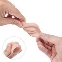 Modèle d'oreille en silicone souple, réaliste et flexible pour la pratique du piercing, destiné aux artistes tatoueurs et à la présentation de bijoux.