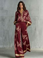 2026 Europese en Amerikaanse stijl vintage print sexy diep V-hals losse print top met rits en wijde pijpen broek tweedelig set