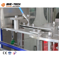 Machine de remplissage automatique de jus de fruits en bouteilles de verre BVE haute précision 200 ml, contrôlée par PLC, électrique et pneumatique, 7000-80000