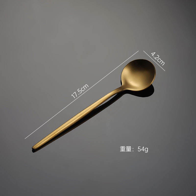 Gold dessert spoon