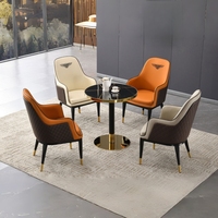 Ensemble table et chaises de réception rondes en pierre, style moderne minimaliste de luxe, écologique et durable pour hôtel, salle d'exposition, usage commercial