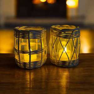 Portavelas de ratán para decoración rústica de casa de campo con diseño tejido intrincado y encanto estético vintage y decoración para el hogar - Product Image 1