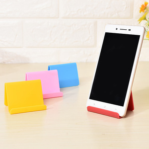 Soporte geométrico portátil para teléfono, soporte de escritorio de plástico para teléfono móvil, amarillo, azul cielo, rosa, rojo brillante - Product Image 1