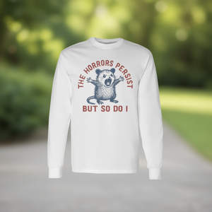 Camiseta de manga larga unisex con cuello redondo para adultos, camiseta promocional con estampado de The Horrors Persist But So Do I - Product Image 3