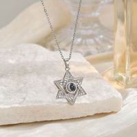 Collier transfrontalier rétro en cuivre électroplaqué avec pendentifs pentagramme et hexagramme, 100 langues, style européen et américain