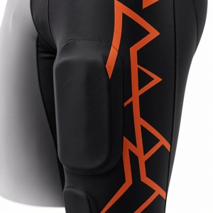 Pantalon de football noir rembourré pour homme avec imprimé géométrique orange, taille élastique ajustée, toutes saisons, vêtements de football américain - Product Image 3