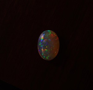 Magnifique pierre précieuse d'opale naturelle éthiopienne Personnalisable Octobre Birthstone Colorful Loose Oval 24x17mm Gemstone - Product Image 5