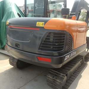 Mini-pelleuse compacte Develon DX60D 6 tonnes, rotation zéro, moteur Yanmar Stage V, prête à l'emploi pour la construction urbaine - Product Image 3