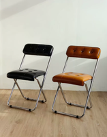 Chaise pliante en cuir ciré de style mid-century, chaise de salle à manger rembourrée de luxe léger avec dossier pour la maison et le café
