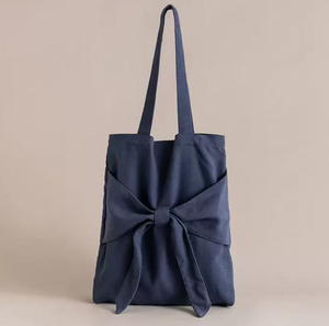 กระเป๋าถือผ้าแคนวาสสีพื้นแบบเปิด ดีไซน์เก๋ไก๋สำหรับนักเรียนหญิง สะพายไหล่เดียว จุของได้เยอะ เหมาะสำหรับช้อปปิ้ง - Product Image 5