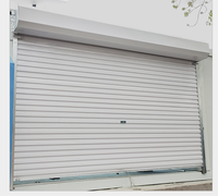 Porte roulante électrique isolée en aluminium de conception moderne pour la maison