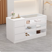 Magasin de vêtements, armoire d'île, magasin de bijoux, présentoir, magasin de vêtements pour femmes, tiroir, caisse enregistreuse, île avec verre