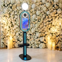 Photomaton à écran tactile ovale de 15,6 pouces avec imprimante, support d'appareil photo, impression instantanée, construction en métal et verre pour fêtes et mariages