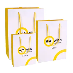 Emballage cadeau de luxe personnalisé HDPK avec corde de coton sac en papier Kraft jaune avec son propre Logo petite entreprise vente en gros