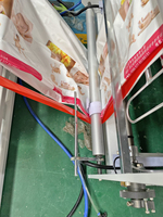 Mesin Pembuat Kantong Popok Otomatis dengan Pegangan Loop Lunak