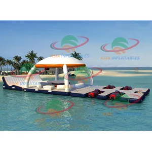 قوارب نفاثة قابلة للنفخ بتصميم مخصص للقفص على الشاطئ قوارب عائمة قابلة للنفخ على الماء يخت جزيرة قابلة للنفخ للحفلات مع خيمة