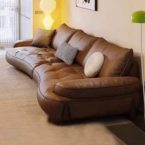 Sofá Italiano Minimalista de Cuero Genuino en Forma de S, Mueble Seccional Curvo para Sala de Estar - Product Image 1