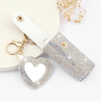 Pochette cylindrique portable pour rouge à lèvres et baume à lèvres, avec strass scintillants, breloque de sac et porte-clés avec miroir