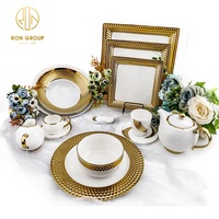 Ensemble de tasses à thé en porcelaine créative de forme ronde en or blanc de luxe pour restaurant et hôtel, ensemble de vaisselle en céramique, tasse à café et soucoupe en céramique