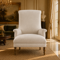 Fauteuil de luxe moderne en cuir avec accoudoirs plissés, dossier haut allongé à motifs festonnés et structure en bois
