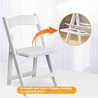 Vente en gros Chaise pliante en résine Wimbledon rembourrée blanche pour jardin extérieur pour mariage et fête