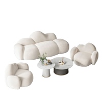 Ensemble de canapés sectionnels en tissu blanc en forme de nuage de luxe moderne style designer créatif avec tables basses meubles de salon d'hôtel