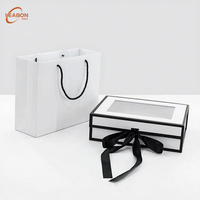 Boîte d'emballage rigide magnétique personnalisée auto-érectible avec fenêtre transparente en PVC et ruban, écologique et recyclée, pour cosmétiques et soins de la peau