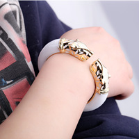 Bracelet manchette ouvert tendance à double tête de léopard émaillée, accessoire de mode animalier, best-seller transfrontalier