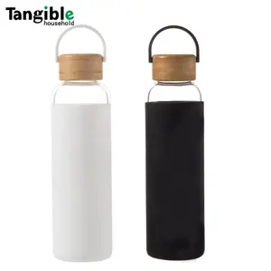 Kostenlose doppelwandige isolierte Boro silikat glas becher Wasser flasche Thermoskannen mit Bambus deckel und Teekanne 550ml tragbar