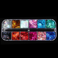 Fluorescence holographique brillante lueur dans la couleur sombre papillon coeur étoile à cinq branches anglais lettre forme Nail Art paillettes