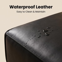 Canapé sectionnel moderne trois places avec dossier en cuir véritable, accoudoirs rembourrés, assise en éponge, acier inoxydable, durable pour hôtel et villa