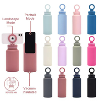 Bouteille d'eau avec couvercle magnétique et support de téléphone en acier inoxydable à double paroi pour le voyage Bouteille d'eau de camping de 24oz avec anneau magnétique