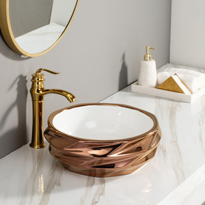 Fregaderos de baño de lujo Best Wash Lavabo de mano Baño Moderno forma especial Lavabo dorado - Product Image 3