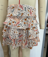 Jupes de tennis décontractées pour filles, imprimées, style swing fluide, mini évasées, plissées, taille haute, à volants superposés avec short intégré pour tout-petits